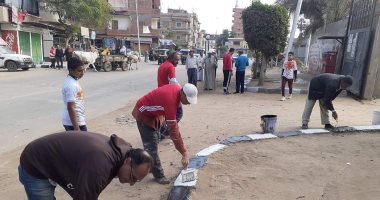 صور.. تنفيذ مبادرة "مدينتي جميلة ونظيفة" بشوارع السنطة بالغربية