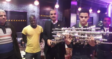 صور.. مصادرة "بيانو وشيش ومكبرات صوت" فى حملة على المنشآت السياحية بالدقى