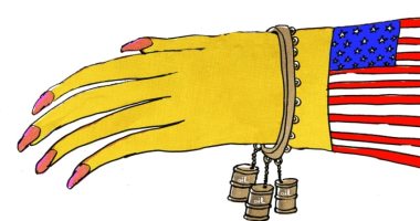 كاريكاتير الصحف الإماراتية.. أمريكا تتحلى بالبترول 