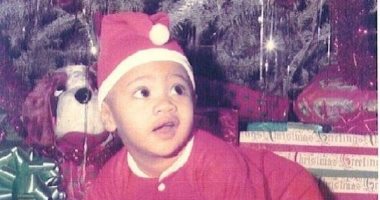 The rock يحتفل بصورة أول كريسماس ارتدى فيه بدلة "بابا نويل"