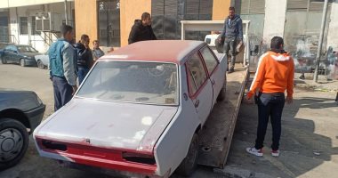 أحياء العاصمة تنفذ قرار مصادرة السيارات المهملة بالشوارع.. صور