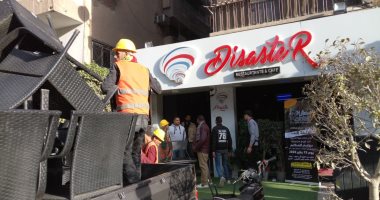 صور.. غلق سنتر تعليمى ورفع إشغالات الكافيهات والمحال بالدقى 