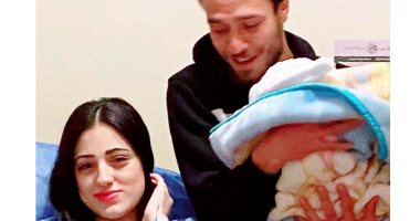 محمد عنتر ودينا الحلو يحتفلان بمولودهما الأول "يامن"