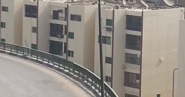 صور.. دهان عقارات طريق النصر وامتداد رمسيس فى القاهرة باللون الموحد