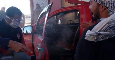 صور.. تعقيم إجبارى للسيارات القادمة لمحافظة الوادى الجديد