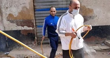 أهالى قرية الوفائية بالبحيرة يطهرون الشوارع .. صورة 