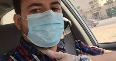 بالجوانتى والكمامة.. علاء يشارك فى مبادرة "اليوم السابع" للوقاية من كورونا