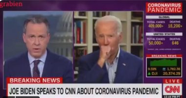 بايدن يتعرض لموقف محرج بسبب سعاله أثناء مقابلة مع CNN.. وترامب يسخر منه