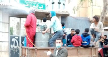 شباب قرية الفنت الشرقية ببنى سويف يعقمون شوارعهم لمواجهة كورونا