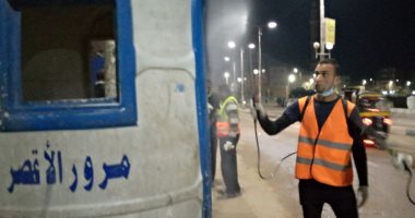 صور.. أهالى الأقصر يلتزمون بتطبيق حظر التجول والشباب يعقمون الشوارع
