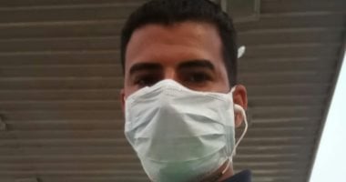 "عادل" من أسيوط يشارك بصورته بالكمامة: احمى نفسك وأهلك من فيروس كورونا