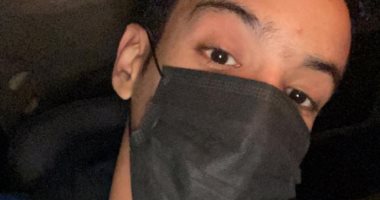 "محمد" يشارك صورته عبر صحافة المواطن بالجوانتى والكمامة للوقاية من كورونا