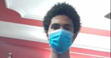 "كريم" من الجيزة يشارك بصورته بالكمامة والجوانتى للحد من العدوى بفيروس كورونا