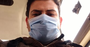 بالكمامة والجوانتى.. "محمود" يشارك فى مبادرة "اليوم السابع" للوقاية من كورونا