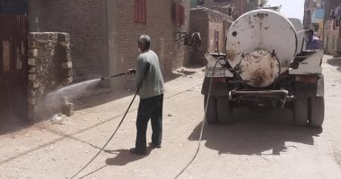مدينة الطود بالأقصر تطلق حملة تعقيم للشوارع والمنشآت ضد فيروس كورونا.. صور