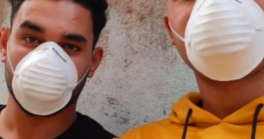 بالجوانتى والكمامة.. "محمد" يشارك فى مبادرة "اليوم السابع" للوقاية من كورونا