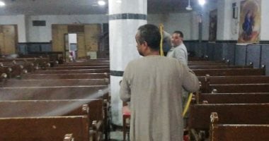 مدينة إسنا تستكمل تعقيم وتطهير مكاتب البريد والكنائس ومنافذ بيع السلع.. صور