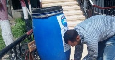 تعقيم الموظفين والمواطنين قبل دخول مكاتب الخدمة فى أبوكبير  بالشرقية.. صور 