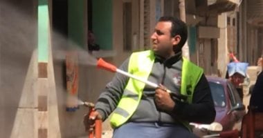 صور.. تطهير شوارع قرية دنوشر بالغربية للحد من انتشار كورونا