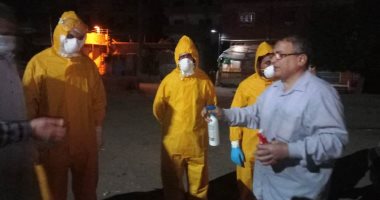 صور.. دفن جثمان أحد مصابي كورونا بمسقط رأسه بقرية الهياتم