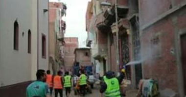 أهالى ههيا بالشرقية يطهرون الشوارع والمنازل للوقاية من فيروس كورونا