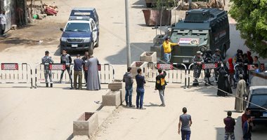 غلق مداخل ومخارج المعتمدية بالجيزة بعد فرض الحجر الصحى بسبب كورونا.. صور