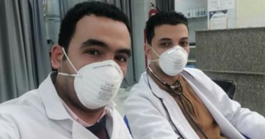بالكمامة والجوانتى.. أطباء مركز القلب بالمحلة يؤدون عملهم