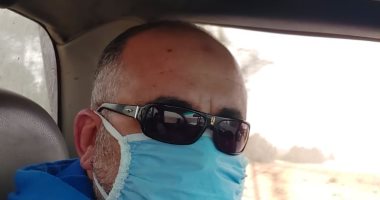 قارئ يشارك مبادرة "اليوم السابع" للوقاية من كورونا بصوره بالجوانتى والكمامة