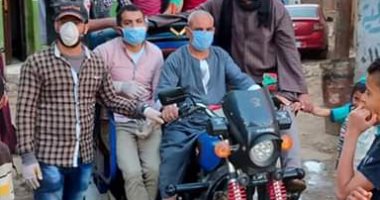 شباب قرية الجفادون ببنى سويف يتطهرون الشوراع للوقاية من كورونا