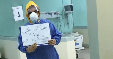 "جيشنا الأبيض".. "محمد" بالزى الواقى من داخل مستشفى العزل بـ15 مايو