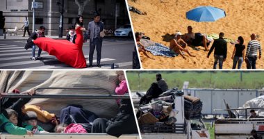 صور..العالم هذا الصباح.. سوريون يفرون من مخيمات أردوغان على حدود تركيا إلى إدلب خوفا من كورونا.. العالم يشدد إجراءات الحظر وأشخاص يخرجون للحدائق والشواطئ.. فوتوسيشن لعروسين فى شوارع ووهان بعد تراجع الوباء