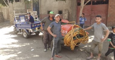 حملة لشباب قرية جوادة بالمنيا لتطهير شوارع ومبانى القرية ضد فيروس كورونا