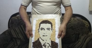 مواطن يصنع صورة لشهيد الواجب والتضحية المقدم محمد الحوفى من الأرز .. صور 