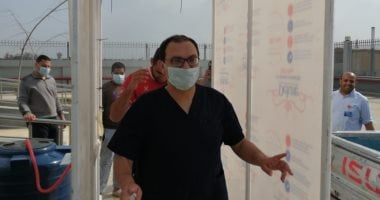 ممر للتعقيم الذاتى لحماية الطاقم الطبى بمستشفى أبو خليفة للحجر الصحى