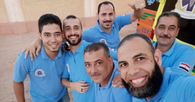 الجيش الأبيض .. صورة جماعية للعاملين باسعاف "ابو دريس" على خط مواجهة كورونا