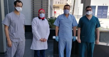 صور.. عودة أطباء جامعة أسيوط بعد قضاء 14 يوم عمل بمستشفى العزل بأتوتيج