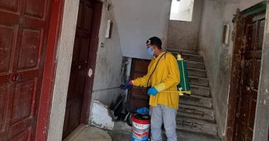 تعقيم عمارتى الحجز المنزلى بمنطقتى "خديجة" و"القابوطى" بضواحى بورسعيد