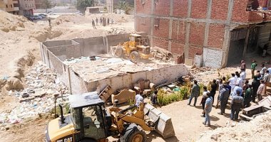 حملات بحى الأربعين وفيصل بالسويس لإزالة التعديات على أراضى وأملاك الدولة.. صور