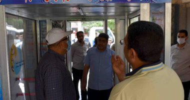 صور.. بوابات تعقيم إلكترونية على مداخل شركة مياه سوهاج لمواجهة كورونا