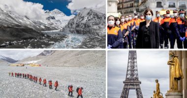 لف العالم من بيتك × 13 صورة.. مساحون يقيسون قمة جبل تشومولانجما.. تماثيل ترتدى أقنعة طبية بفرنسا.. لبنانيون يلعبون كرة المضرب على الشاطئ.. صينيان يستمتعان بالتنزه.. والشرطة الهندية تحيى المقاتلين ضد كورونا