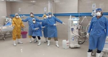 الجيش الأبيض.. صورة جماعية للعاملين بمستشفى إسنا للعزل الصحى فى مواجهة كورونا