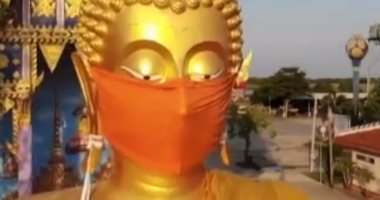 حتى بوذا لبسوه كمامة.. معبد فى بانكوك يحث المواطنين على الوقاية من كورونا