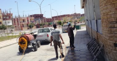 صور.. رش وتطهير الموقف الإقليمى بمدينة الصالحية الجديدة فى الشرقية