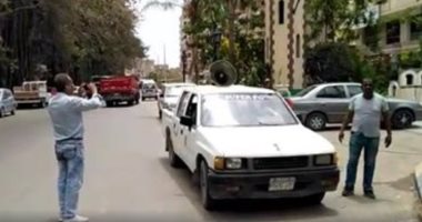 محافظة الجيزة تدفع بسيارات تجوب الشوارع لتوعية المواطنين بطرق الوقاية من كورونا.. صور