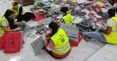 مسلم ومسيحى إيد وحدة ضد فيروس كورونا لمساعدة المتضررين بعين شمس