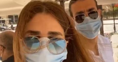 رامي صبري وشيما صابر يتحديان كورونا بالكمامة في شهر العسل