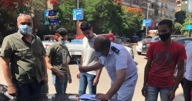 حى الدقى يحرر محاضر لـ18 شخصا من أصحاب المحال لعدم التزامهم بارتداء الكمامة.. صور
