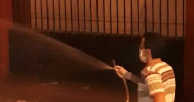 صور.. تطهير وتعقيم وسائل النقل ومحيط مستشفى العزل بملوى بالمنيا  
