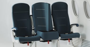 تصميم مقاعد جديدة للطائرات لإجبار المسافرين على بالتباعد الاجتماعى.. صور
