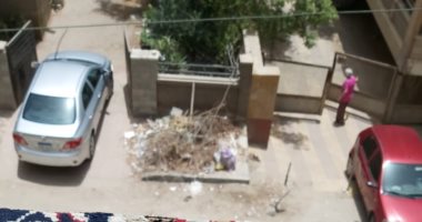 سكان شارع على الليثى بأرض الجولف يشكون انتشار تراكمات القمامة